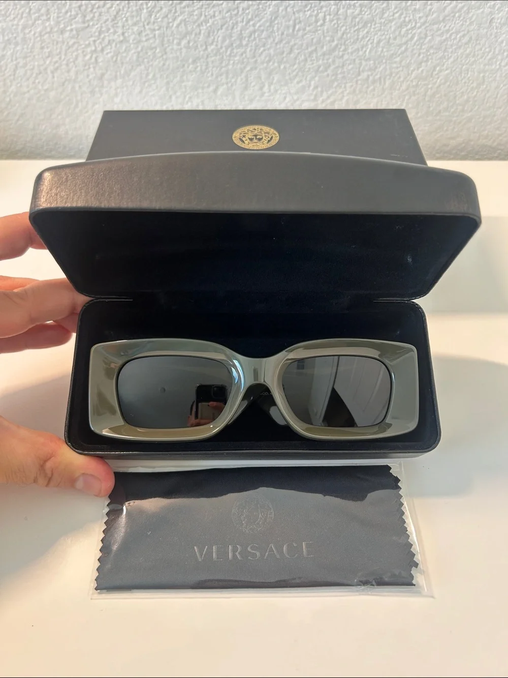 Versace selling pair